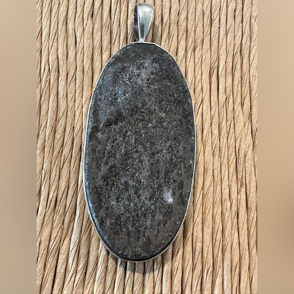 925 stamped silver and rough sparkly stone oval cut pendant thick